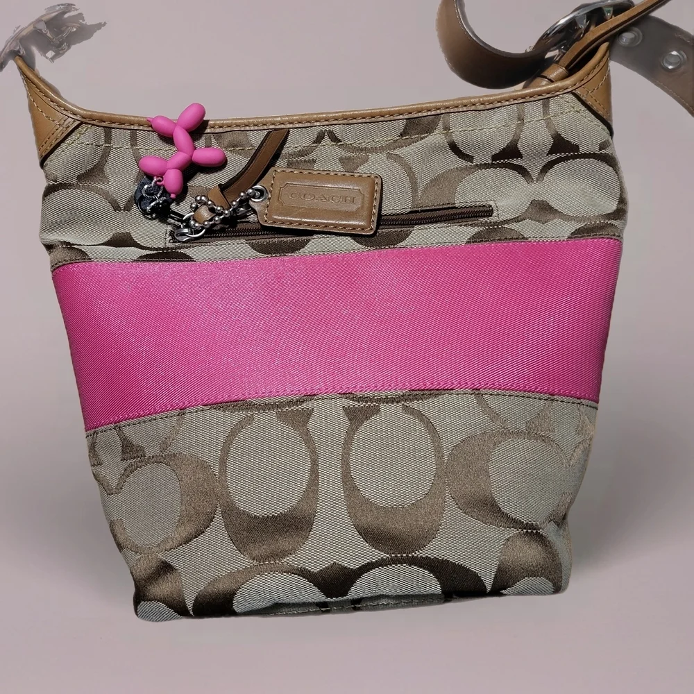 Coach Rugby Stripe Signature Duffle Bag.